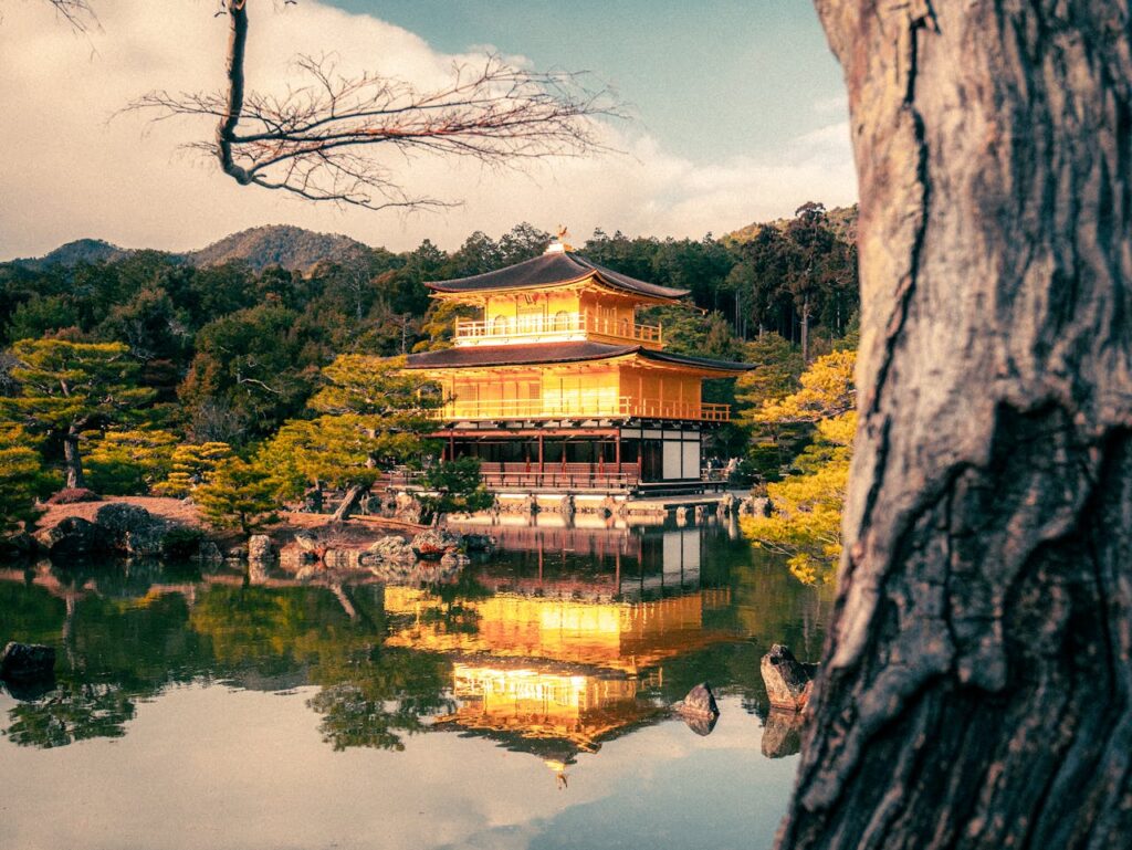 Stunning view of Kinkaku-ji, the Golden Pavilion, reflecting in Kyoto's serene pond.